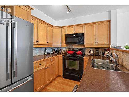 550 Rainbow Drive Unit# 302, Kaslo, BC - Indoor Photo Showing Kitchen With Double Sink