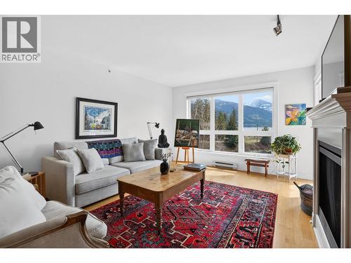 550 Rainbow Drive Unit# 302, Kaslo, BC - Indoor Photo Showing Living Room With Fireplace