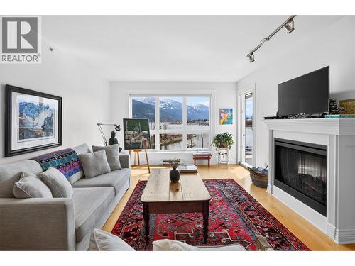 550 Rainbow Drive Unit# 302, Kaslo, BC - Indoor Photo Showing Living Room With Fireplace