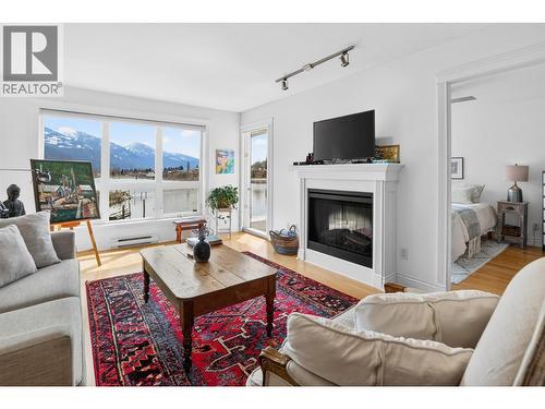550 Rainbow Drive Unit# 302, Kaslo, BC - Indoor Photo Showing Living Room With Fireplace