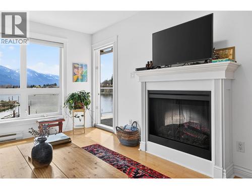 550 Rainbow Drive Unit# 302, Kaslo, BC - Indoor Photo Showing Living Room With Fireplace