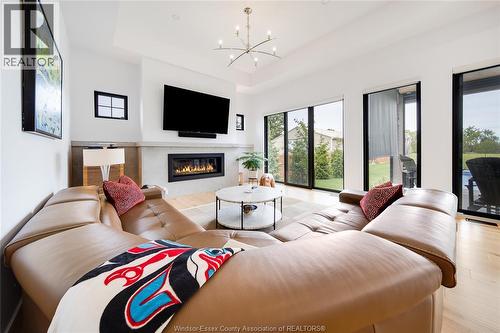 77 Bissonnette Lane, Lakeshore, ON - Indoor Photo Showing Living Room With Fireplace