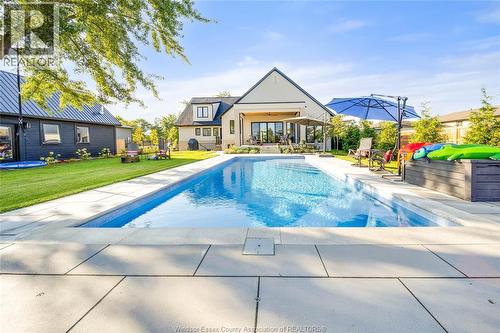 77 Bissonnette Lane, Lakeshore, ON - Outdoor With In Ground Pool