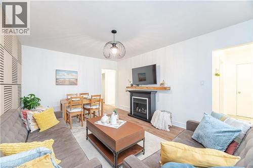 297 Mohawk Road W, Hamilton, ON - Indoor Photo Showing Living Room With Fireplace