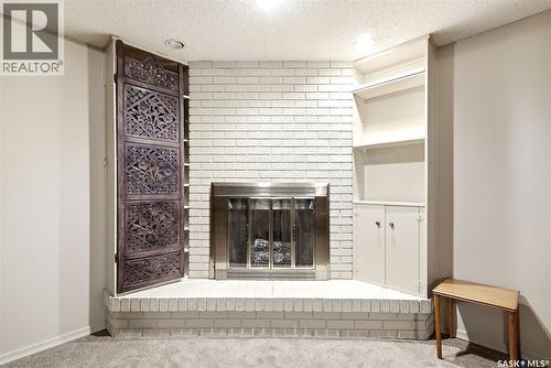 1106 Gryphons Walk, Regina, SK - Indoor With Fireplace