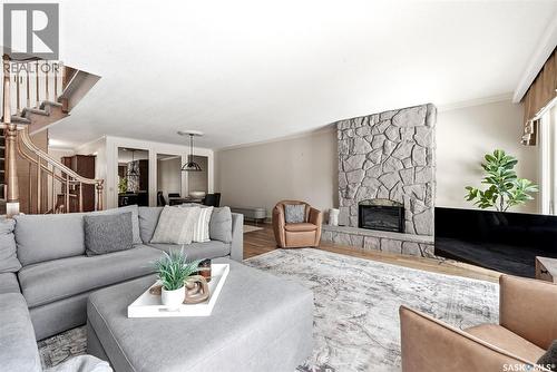 1106 Gryphons Walk, Regina, SK - Indoor Photo Showing Living Room With Fireplace