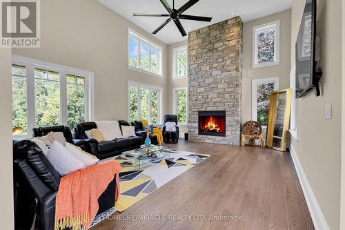 4427 Concession 7, Puslinch, ON - Indoor Photo Showing Living Room With Fireplace