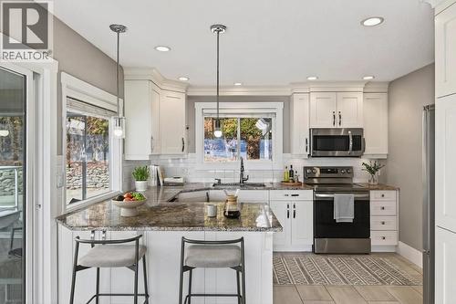 **virtually staged** - 3940 Angus Drive, West Kelowna, BC - Indoor Photo Showing Kitchen With Upgraded Kitchen
