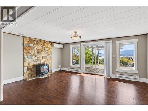 3940 Angus Drive, West Kelowna, BC - Indoor Photo Showing Living Room With Fireplace