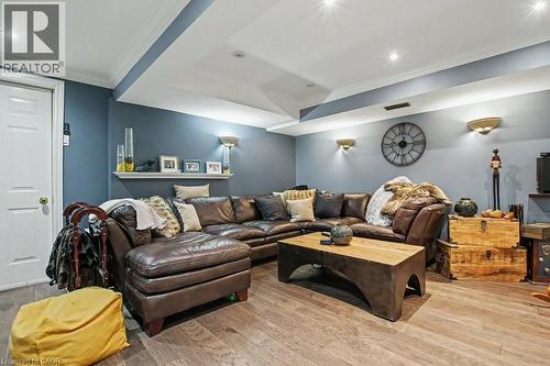 Spacious interior with wood-finish flooring, recessed lighting, and wall sconces - 2324 Homer Drive, Burlington, ON - Indoor Photo Showing Living Room