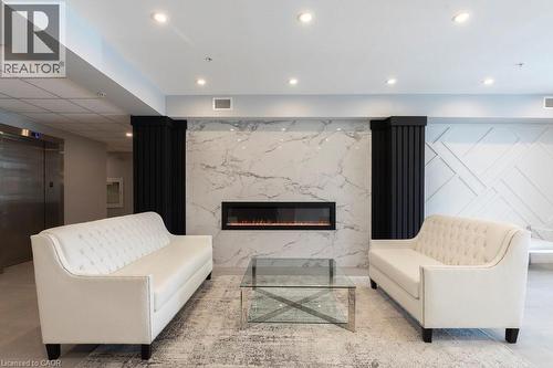 120 Springvalley Crescent Unit# 208, Hamilton, ON - Indoor With Fireplace