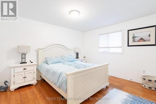 100 Desroches Trail, Tiny, ON - Indoor Photo Showing Bedroom