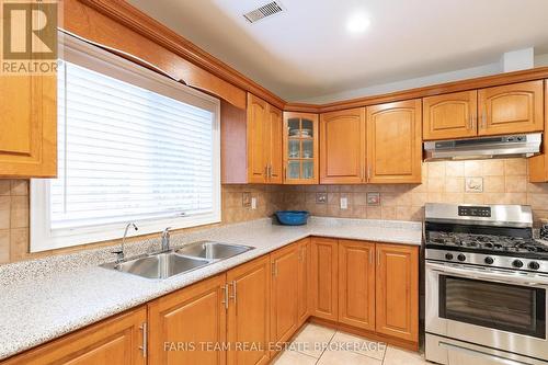 100 Desroches Trail, Tiny, ON - Indoor Photo Showing Kitchen With Double Sink