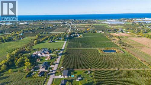 Aerial overview of property's location featuring abundant farmland, rural landscape, and a large body of water - 5391 King Street, Lincoln, ON 