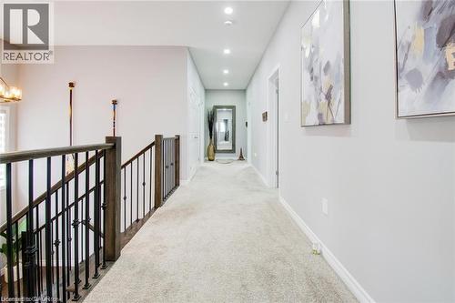 Hall, recessed lighting, and an upstairs landing - 49 Scots Pine Trail, Kitchener, ON - Indoor Photo Showing Other Room