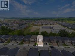 Aerial overview of property's location with nearby suburban area - 