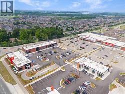 Aerial view of nearby commercial area - 