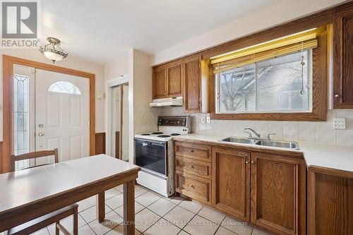 Functional Eat-In Kitchen - 4169 Wilcox Road, Mississauga, ON - Indoor Photo Showing Kitchen With Double Sink