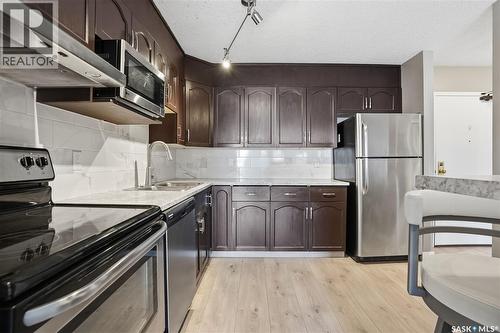 307 2275 Mcintyre Street, Regina, SK - Indoor Photo Showing Kitchen With Double Sink