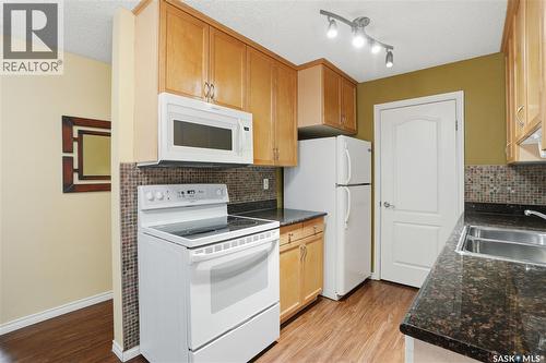 104D2 1121 Mckercher Drive, Saskatoon, SK - Indoor Photo Showing Kitchen With Double Sink