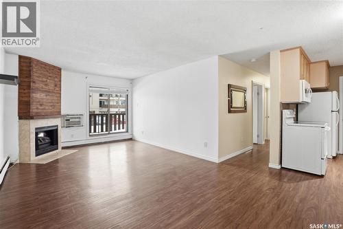 104D2 1121 Mckercher Drive, Saskatoon, SK - Indoor With Fireplace