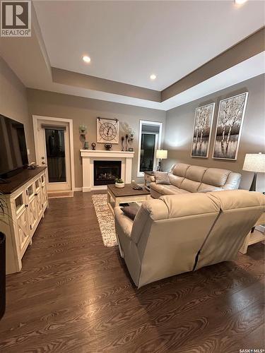 2030 Nicholson Road, Estevan, SK - Indoor Photo Showing Living Room With Fireplace