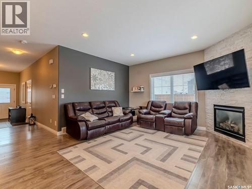 311 115 Salloum Crescent, Saskatoon, SK - Indoor Photo Showing Living Room With Fireplace