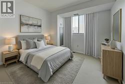 Bedroom featuring light colored carpet Virtually Staged - 
