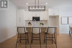 Tiled Backsplash and OTR Microwave Combo Added - 