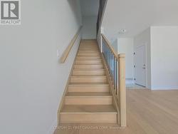 Upgraded Poplar Stained Stairs & Railing - 