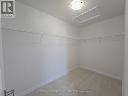 Primary Walk-In Closet - 