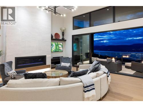 5650 The Edge Place Unit# 111, Kelowna, BC - Indoor Photo Showing Living Room With Fireplace