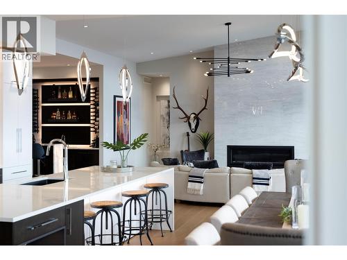 5650 The Edge Place Unit# 111, Kelowna, BC - Indoor With Fireplace