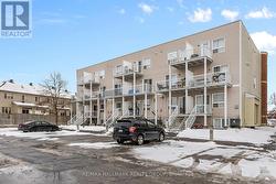 Corner exterior condo view Winter - 