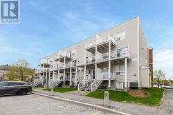 Corner exterior condo Summer - 