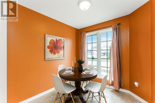 Virtually Staged Sun-filled breakfast nook - 896 Longfields Drive, Ottawa, ON - Indoor Photo Showing Dining Room