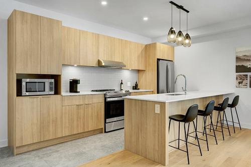 Cuisine - Rue Blondin, Sainte-Adèle, QC - Indoor Photo Showing Kitchen With Upgraded Kitchen