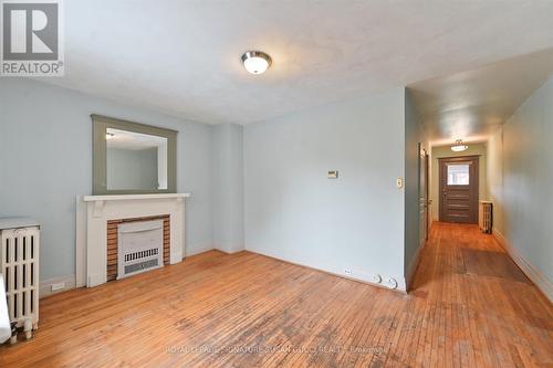 9 Everett Crescent, Toronto, ON - Indoor Photo Showing Other Room With Fireplace