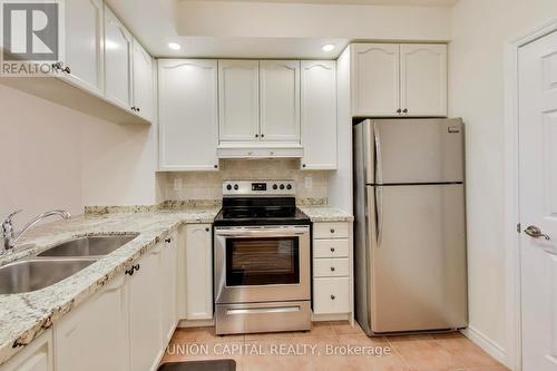 1104 - 5229 Dundas Street W, Toronto, ON - Indoor Photo Showing Kitchen With Double Sink
