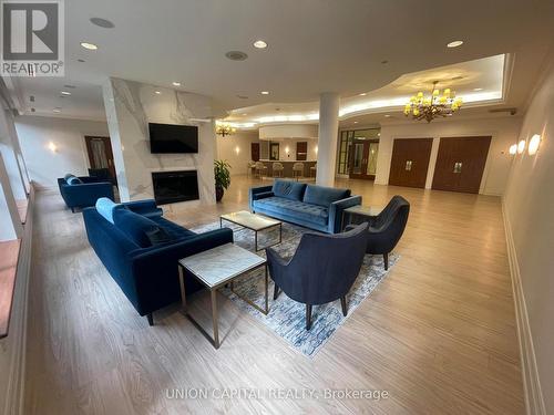 1104 - 5229 Dundas Street W, Toronto, ON - Indoor Photo Showing Living Room With Fireplace