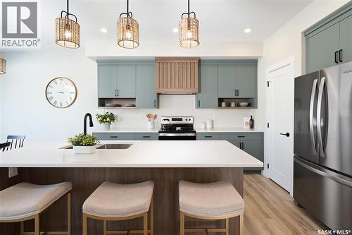 3004 Dumont Way, Regina, SK - Indoor Photo Showing Kitchen With Upgraded Kitchen