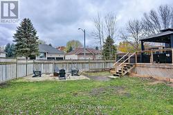 Fully Fenced Backyard with Fire Pit Area - 