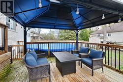 Seating Area Over Looking Above Ground Pool - 