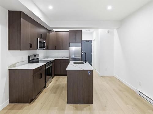 129 5Th Avenue, Swan River, MB - Indoor Photo Showing Kitchen With Stainless Steel Kitchen With Upgraded Kitchen