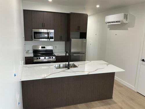 129 5Th Avenue, Swan River, MB - Indoor Photo Showing Kitchen
