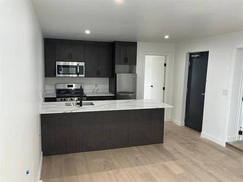 129 5Th Avenue, Swan River, MB - Indoor Photo Showing Kitchen