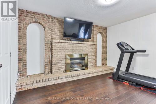 1267 Limeridge Road E, Hamilton, ON - Indoor Photo Showing Gym Room With Fireplace