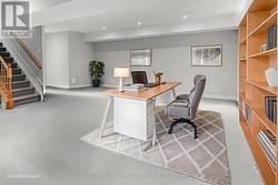 Virtually staged -office opposite LL family room - 
