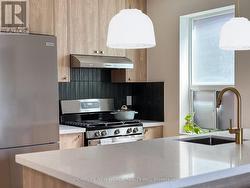 UPPER - 27 MARIGOLD AVENUE  Toronto, ON M4M 3B1