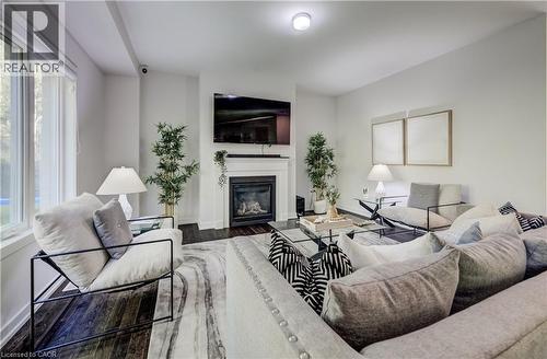 55 Tulip Crescent, Simcoe, ON - Indoor Photo Showing Living Room With Fireplace
